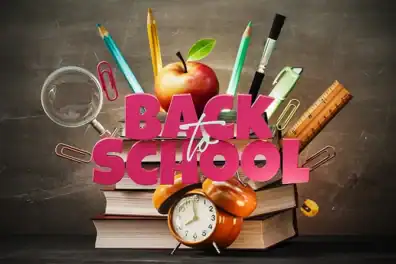 School supplies with apple, clock, and books for back to school.