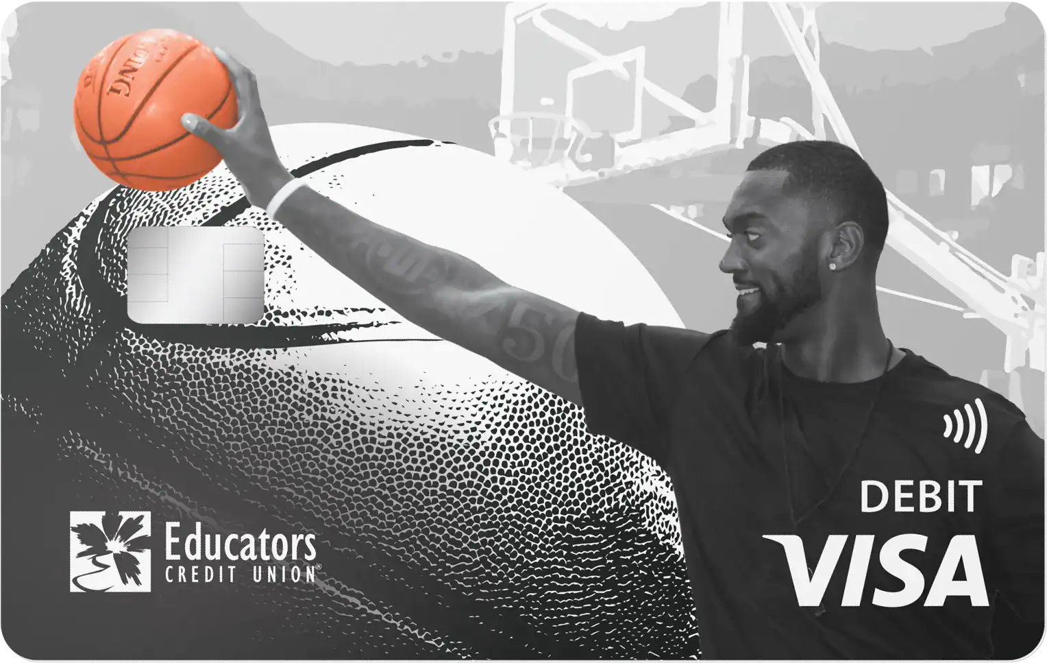 Milwaukee basketball player holding a basketball on a Visa<sup>&reg;</sup> Debit Card.