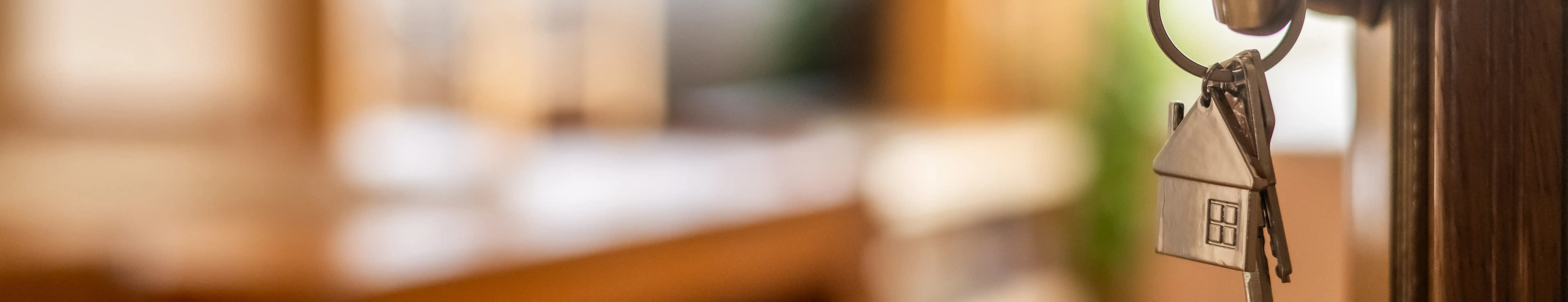 A home key representing buying a home with a mortgage loan that fits you.