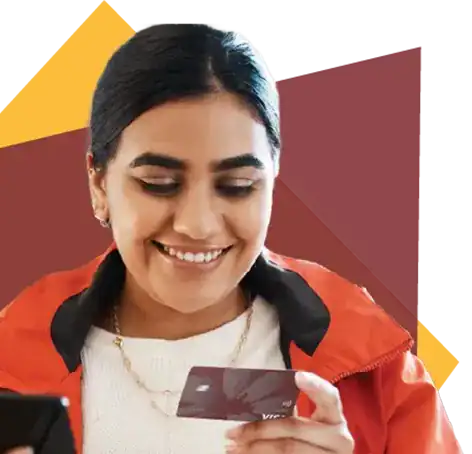 A person happily looking at their card