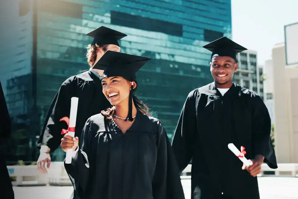 Happy students celebrating their diplomas
