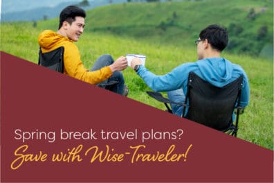 Two men sitting in chairs outside Save With Wise-Traveler