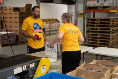 Educators Credit Union staff making a difference in the community by volunteering at local food bank.