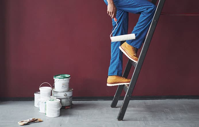 Man painting home
