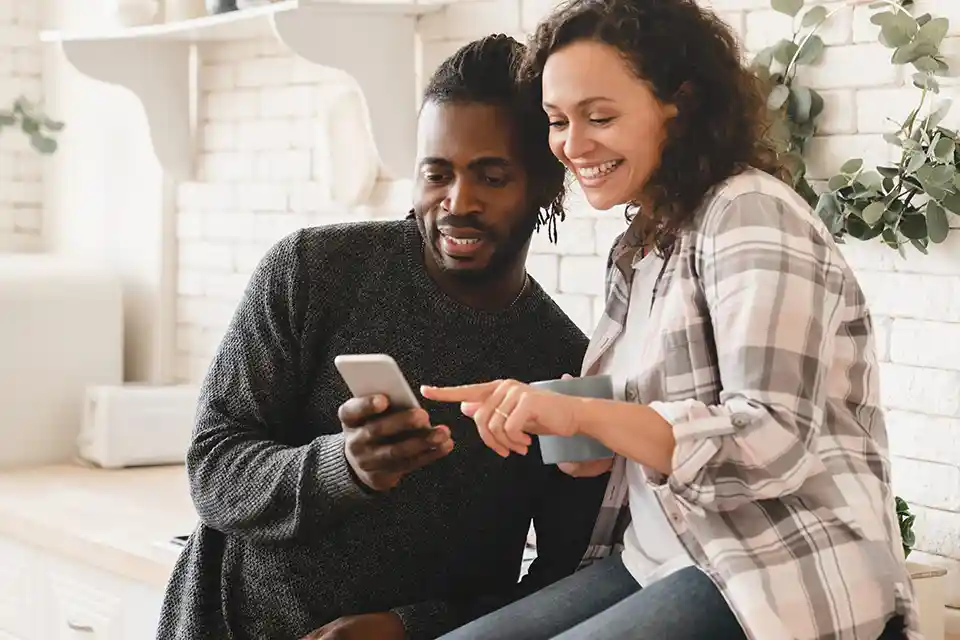 Couple using Online and Mobile Banking