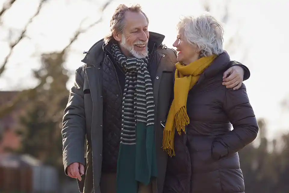 Elderly couple walking