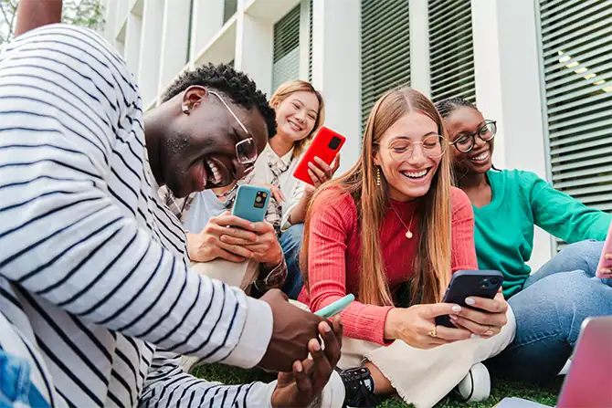 Teens with student accounts using their account on mobile banking on their device