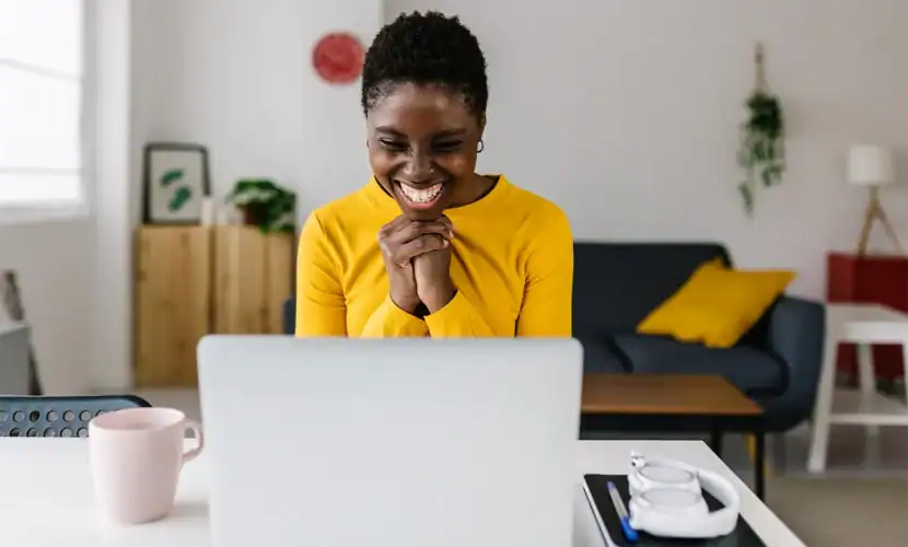 Woman on a video call on her computer.